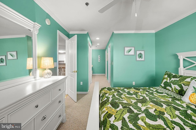 bedroom with recessed lighting, baseboards, light colored carpet, and crown molding