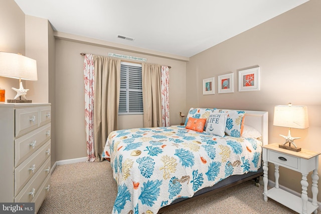 bedroom featuring carpet flooring, baseboards, and visible vents