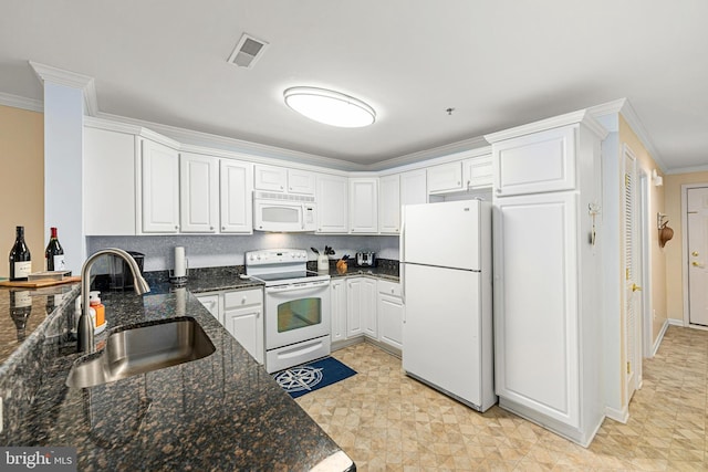 kitchen with visible vents, ornamental molding, white cabinets, white appliances, and a sink