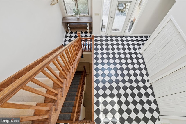 staircase with a skylight