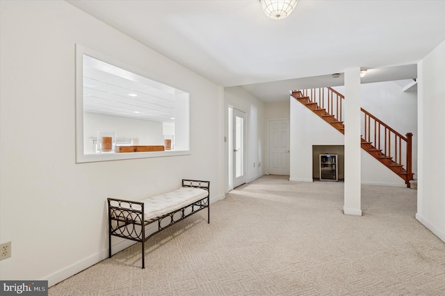 interior space with recessed lighting, stairway, and baseboards