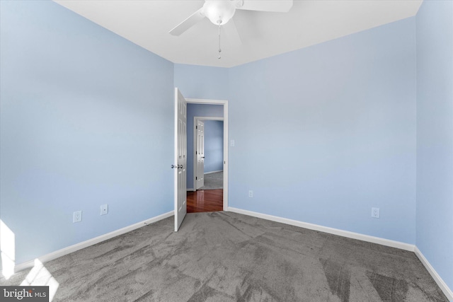 unfurnished bedroom with baseboards, a ceiling fan, and carpet flooring