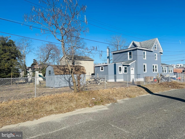 view of home's exterior with fence private yard