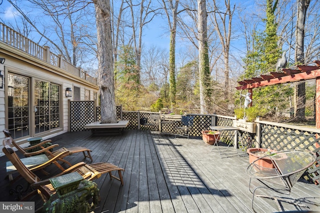 wooden terrace featuring a pergola