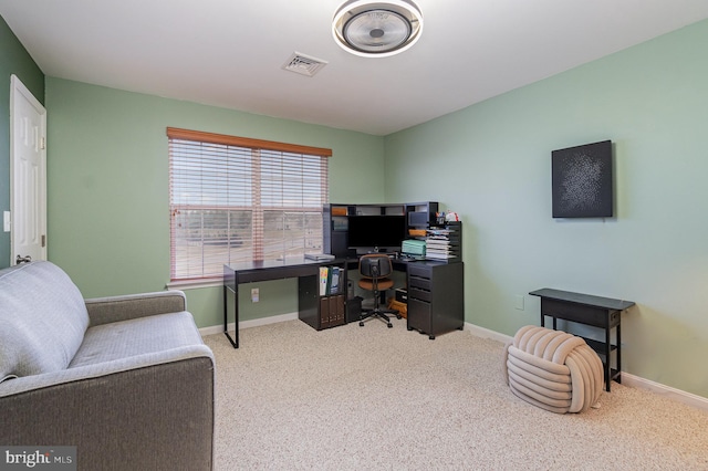 office featuring baseboards, visible vents, and carpet floors