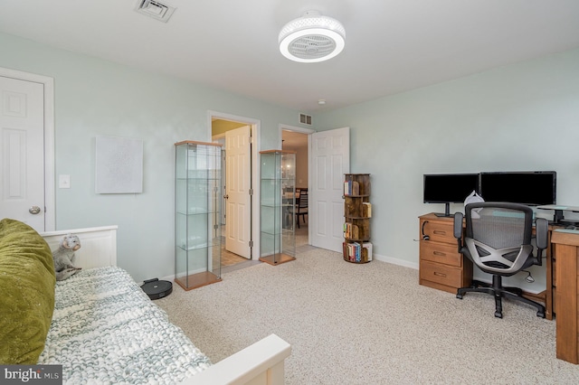 bedroom with visible vents and baseboards