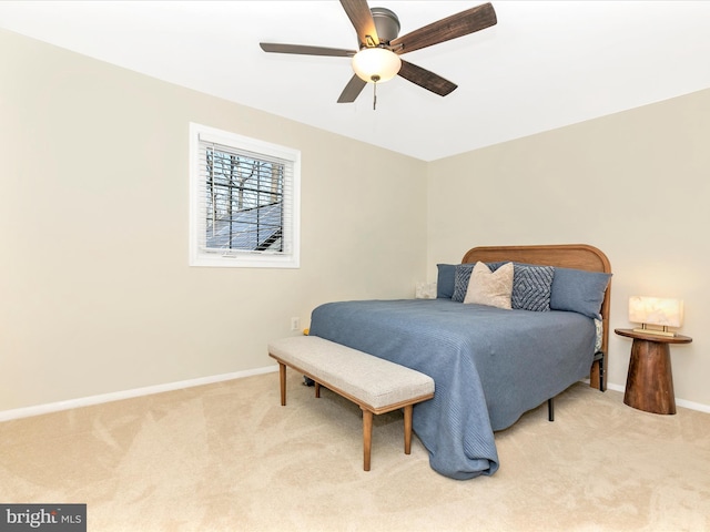 bedroom with carpet flooring, ceiling fan, and baseboards