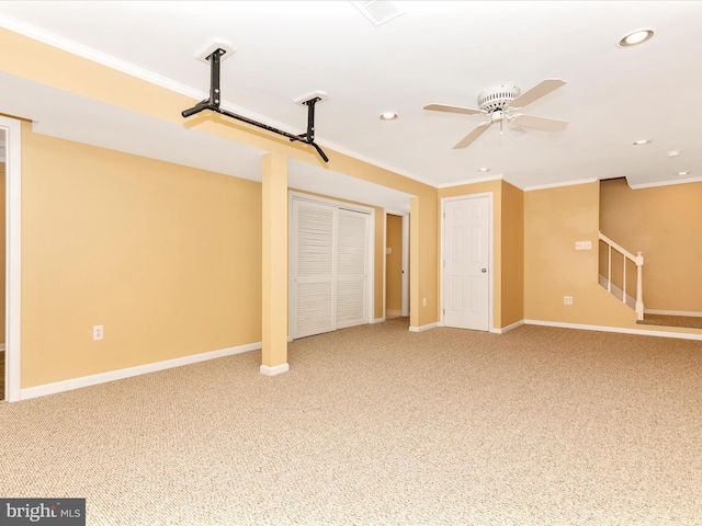 interior space featuring baseboards, light colored carpet, and ornamental molding