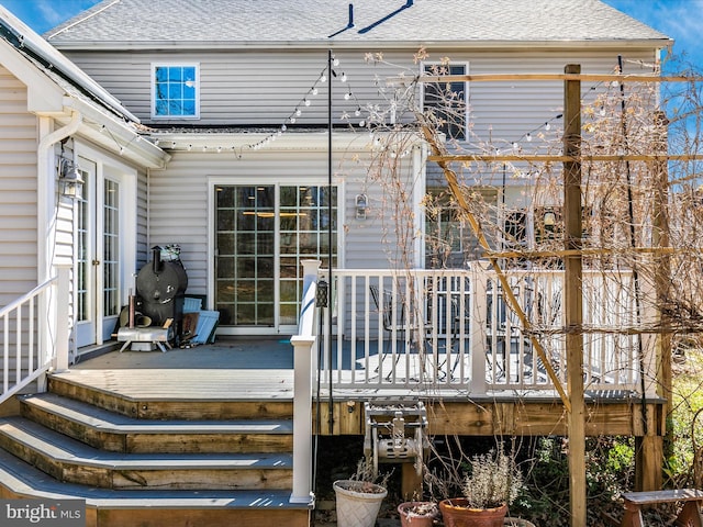 wooden terrace featuring french doors