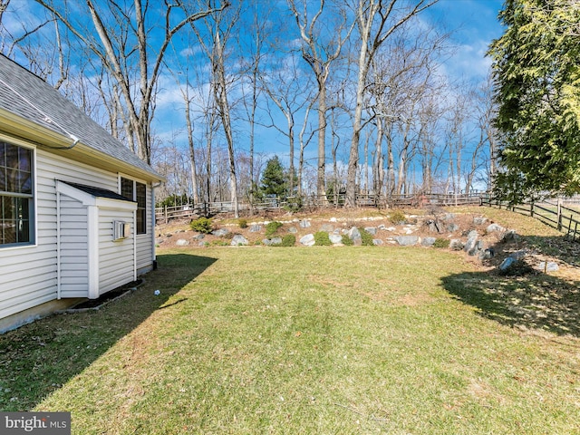 view of yard with fence