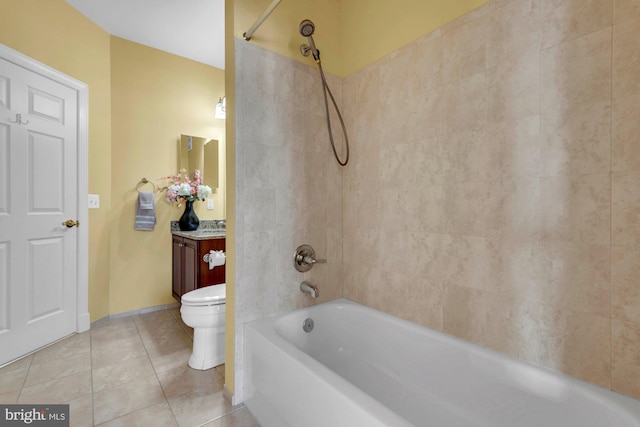 bathroom with vanity, tile patterned floors, bathing tub / shower combination, and toilet