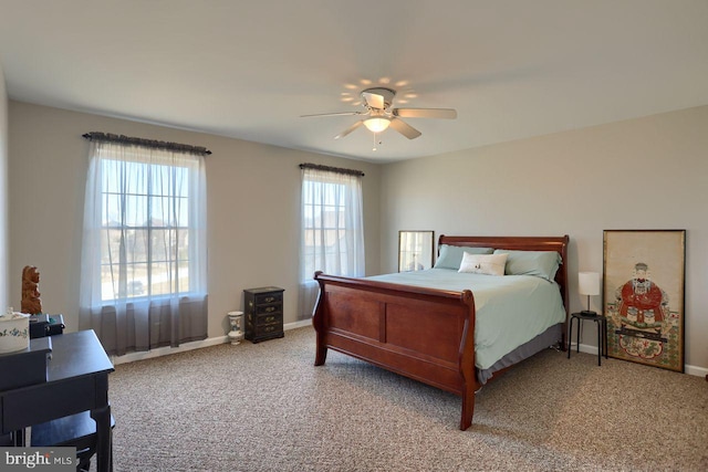 bedroom with baseboards, ceiling fan, and carpet flooring