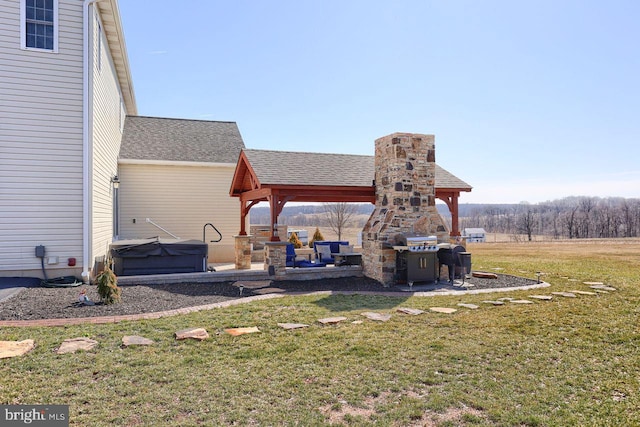 view of yard featuring a gazebo, a hot tub, and a patio