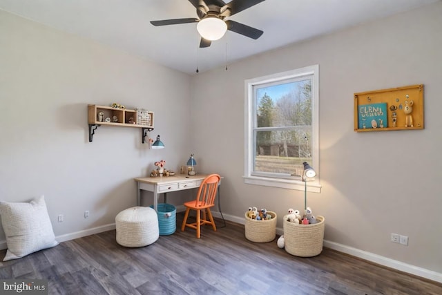 office area with wood finished floors, baseboards, and ceiling fan