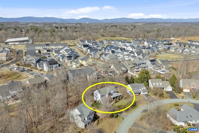 bird's eye view featuring a mountain view and a residential view