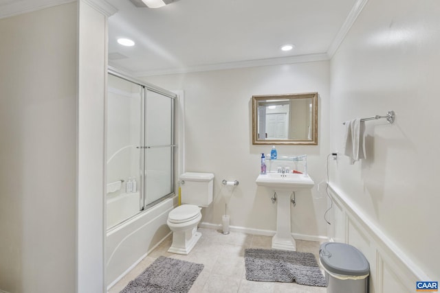 full bathroom with toilet, combined bath / shower with glass door, recessed lighting, crown molding, and tile patterned flooring