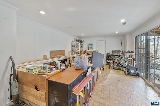 office area featuring visible vents, recessed lighting, a workshop area, and crown molding