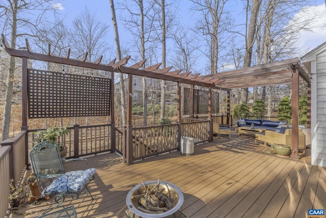 wooden deck featuring outdoor lounge area and a pergola