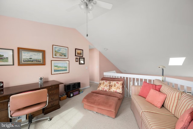 interior space featuring carpet flooring, a ceiling fan, and vaulted ceiling