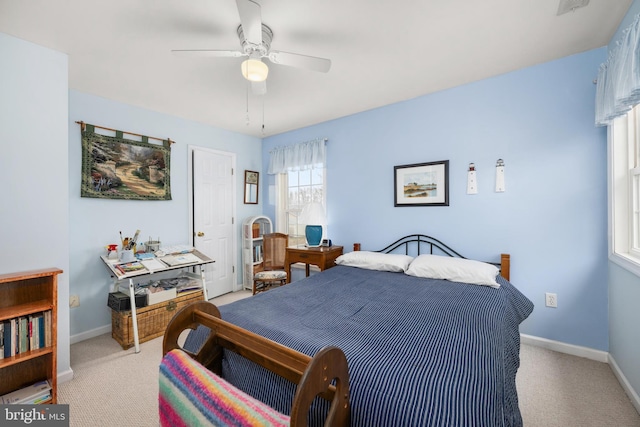 bedroom with baseboards, ceiling fan, and carpet flooring