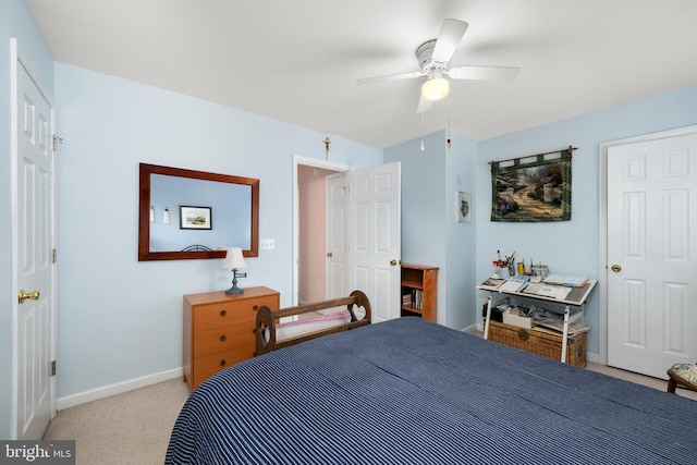 bedroom with baseboards, light carpet, and ceiling fan