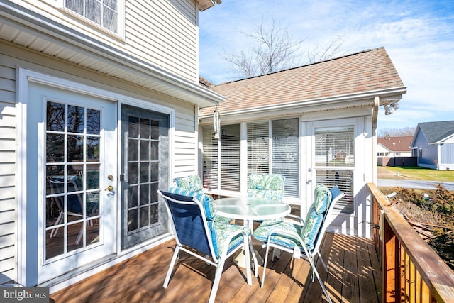 deck featuring outdoor dining area