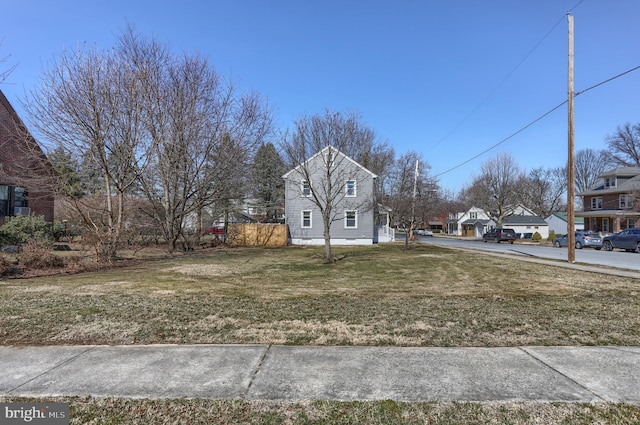 exterior space with a front yard