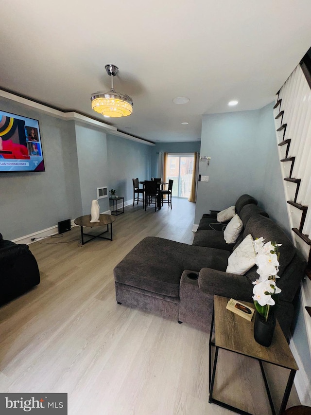 531 E Luray St, Philadelphia, PA 19120 - living area with stairway, baseboards, visible vents, and wood finished floors