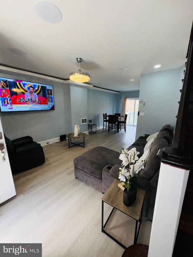 531 E Luray St, Philadelphia, PA 19120 - living room with wood finished floors, visible vents, and baseboards