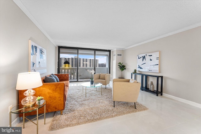 living area with baseboards, a textured ceiling, and crown molding