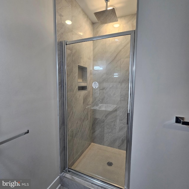 bathroom featuring a stall shower