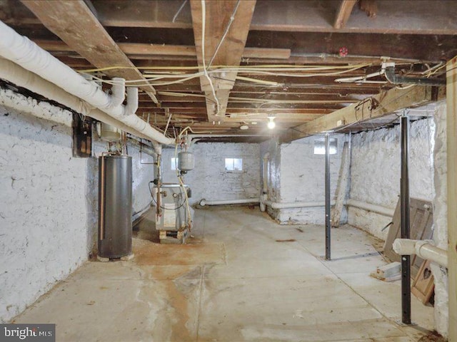 basement with a heating unit and water heater
