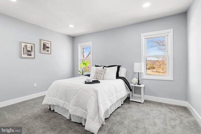 carpeted bedroom with recessed lighting and baseboards