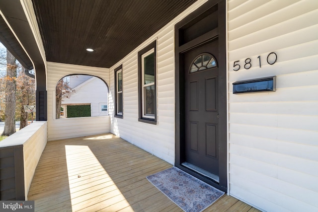 entrance to property with covered porch