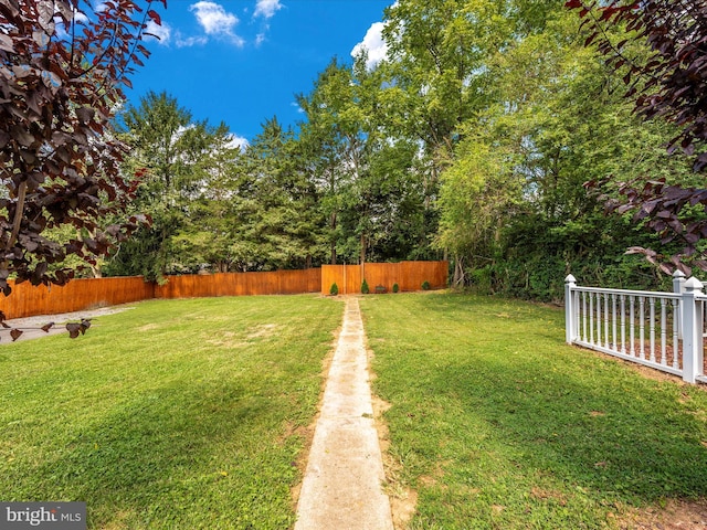 view of yard with fence