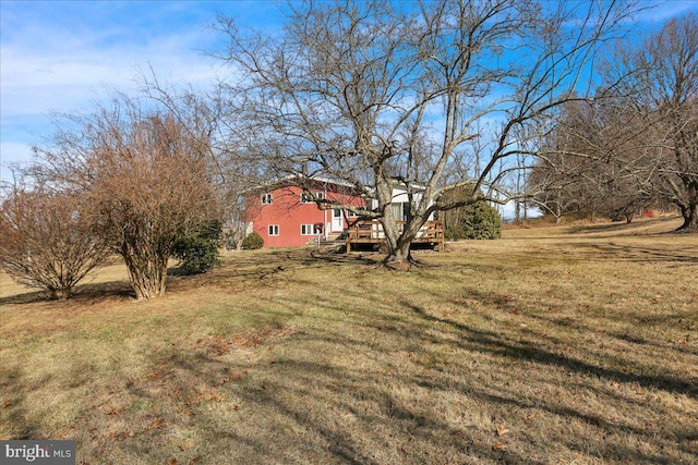 view of yard with a deck