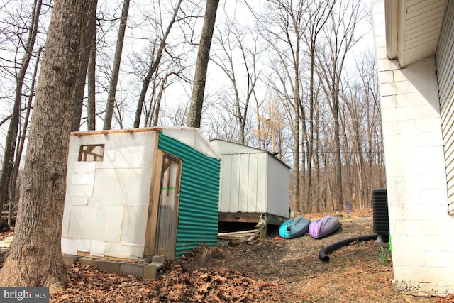 view of outdoor structure featuring an outdoor structure and central air condition unit