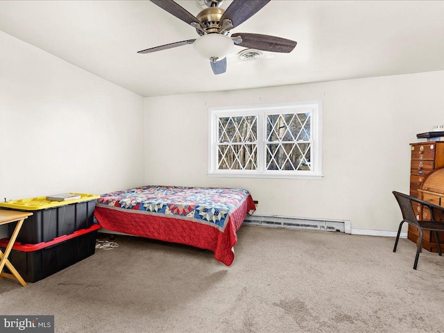 carpeted bedroom featuring a baseboard heating unit, visible vents, and ceiling fan