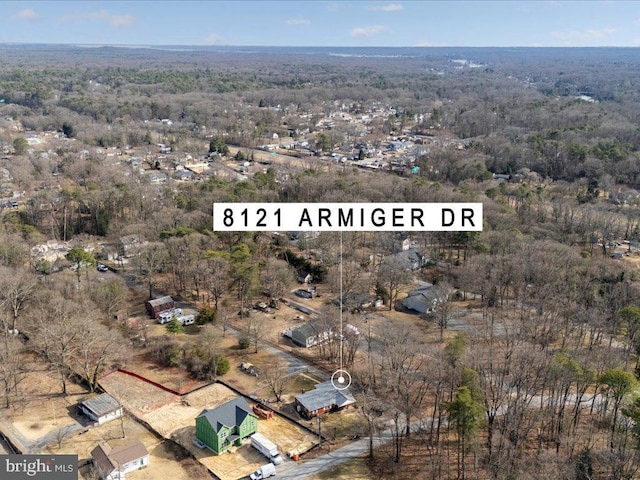 bird's eye view featuring a view of trees