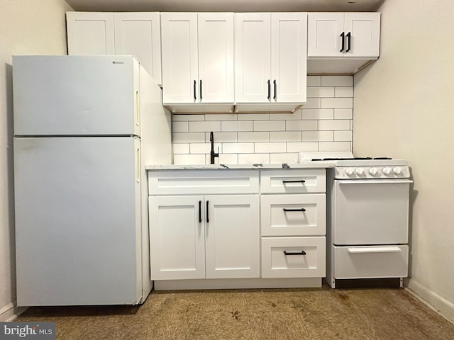 kitchen featuring white cabinetry, white appliances, light countertops, and tasteful backsplash