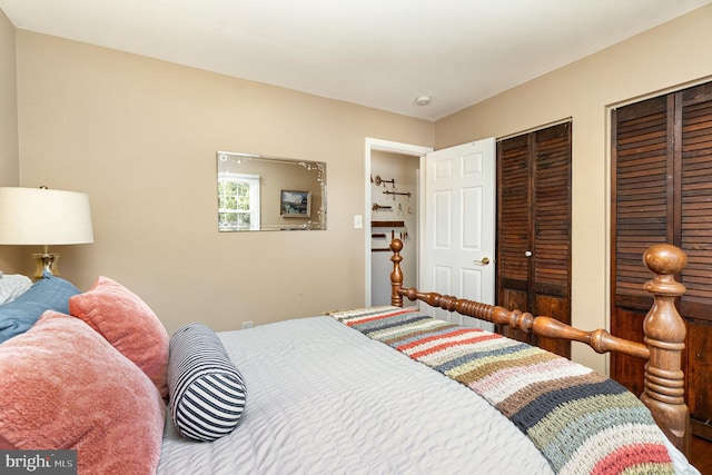 bedroom featuring two closets