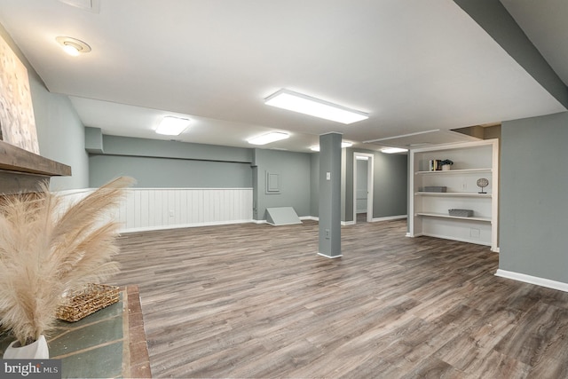 finished basement featuring wood finished floors