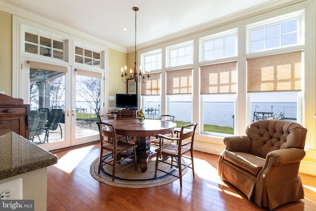 11520 Magnolia Ct, Issue, MD 20645 - dining area with crown molding, hardwood / wood-style floors, a chandelier, and french doors