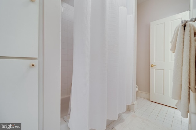 11520 Magnolia Ct, Issue, MD 20645 - full bathroom with tile patterned floors, toilet, and shower / bath combo