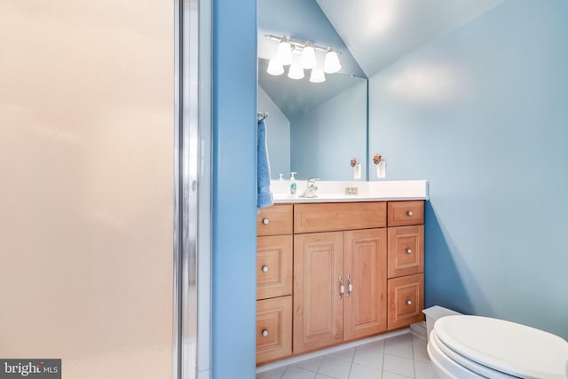 11520 Magnolia Ct, Issue, MD 20645 - bathroom featuring lofted ceiling, toilet, vanity, and tile patterned flooring