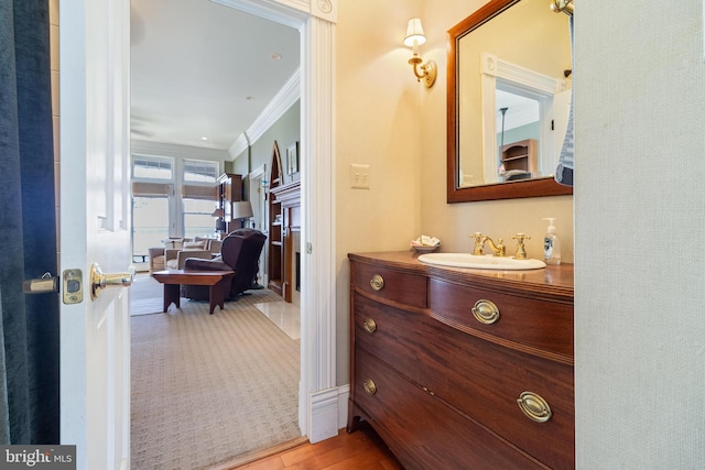 11520 Magnolia Ct, Issue, MD 20645 - bathroom featuring crown molding and vanity
