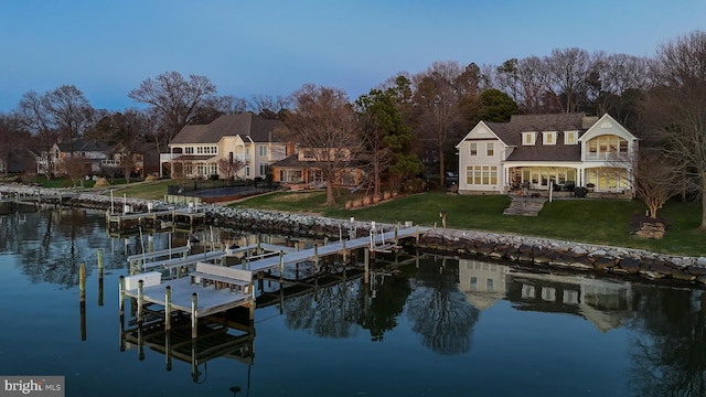 11520 Magnolia Ct, Issue, MD 20645 - dock area with boat lift, a water view, a yard, and a patio