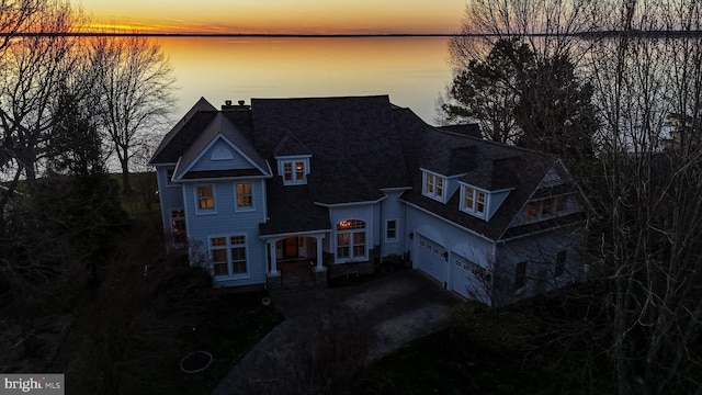 11520 Magnolia Ct, Issue, MD 20645 - shingle-style home featuring an attached garage, driveway, and roof with shingles