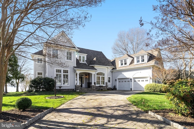 11520 Magnolia Ct, Issue, MD 20645 - shingle-style home featuring asphalt driveway, a front yard, and an attached garage