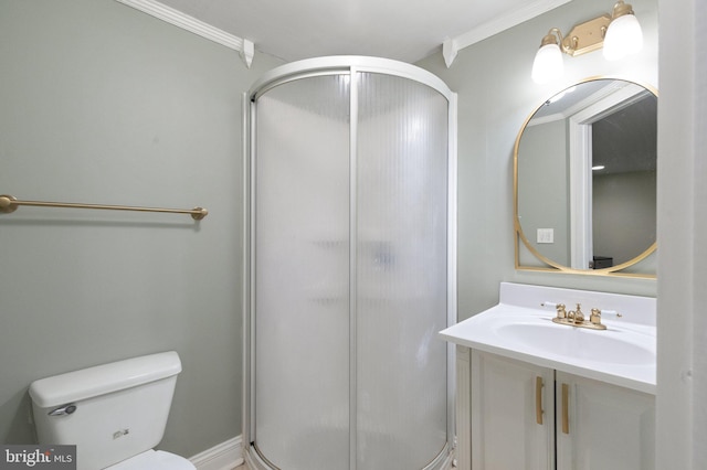 bathroom with a shower stall, toilet, and ornamental molding